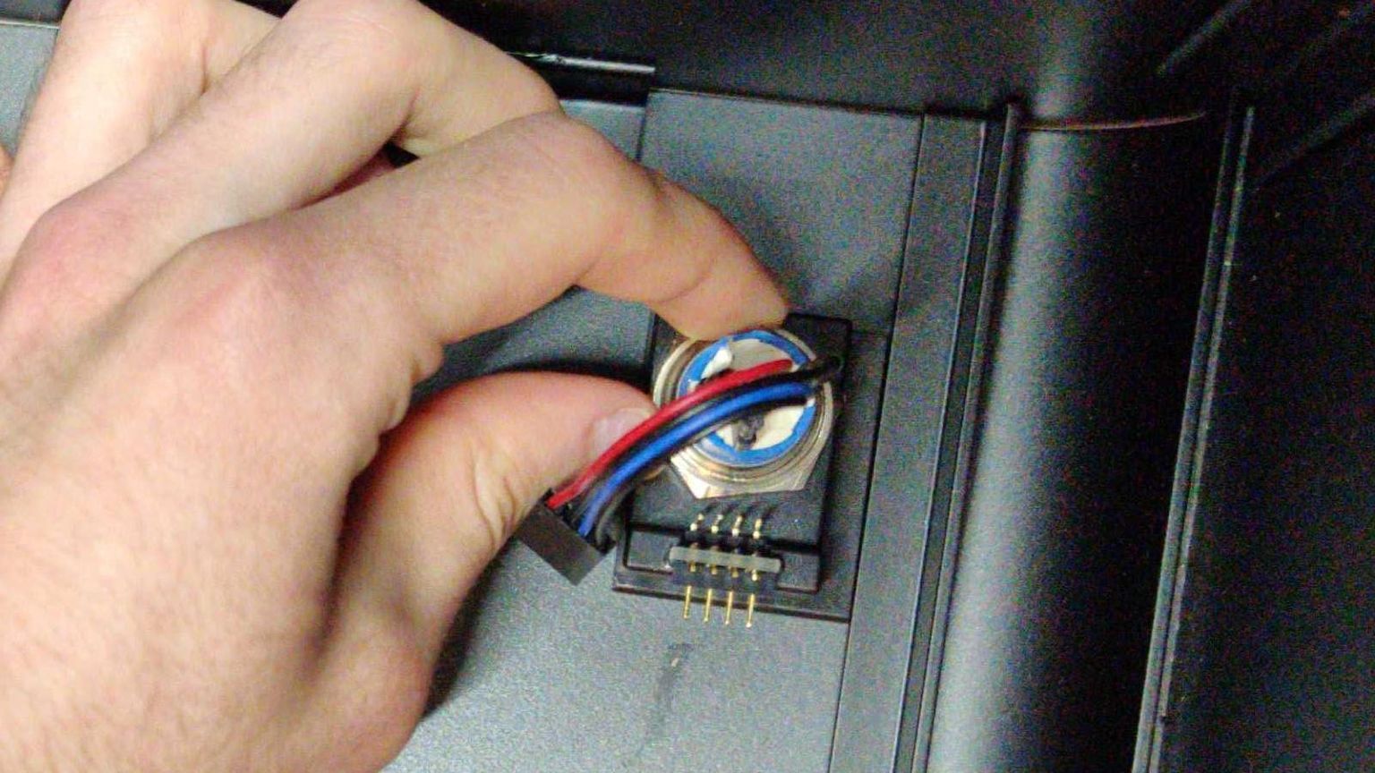 Unscrewing the button