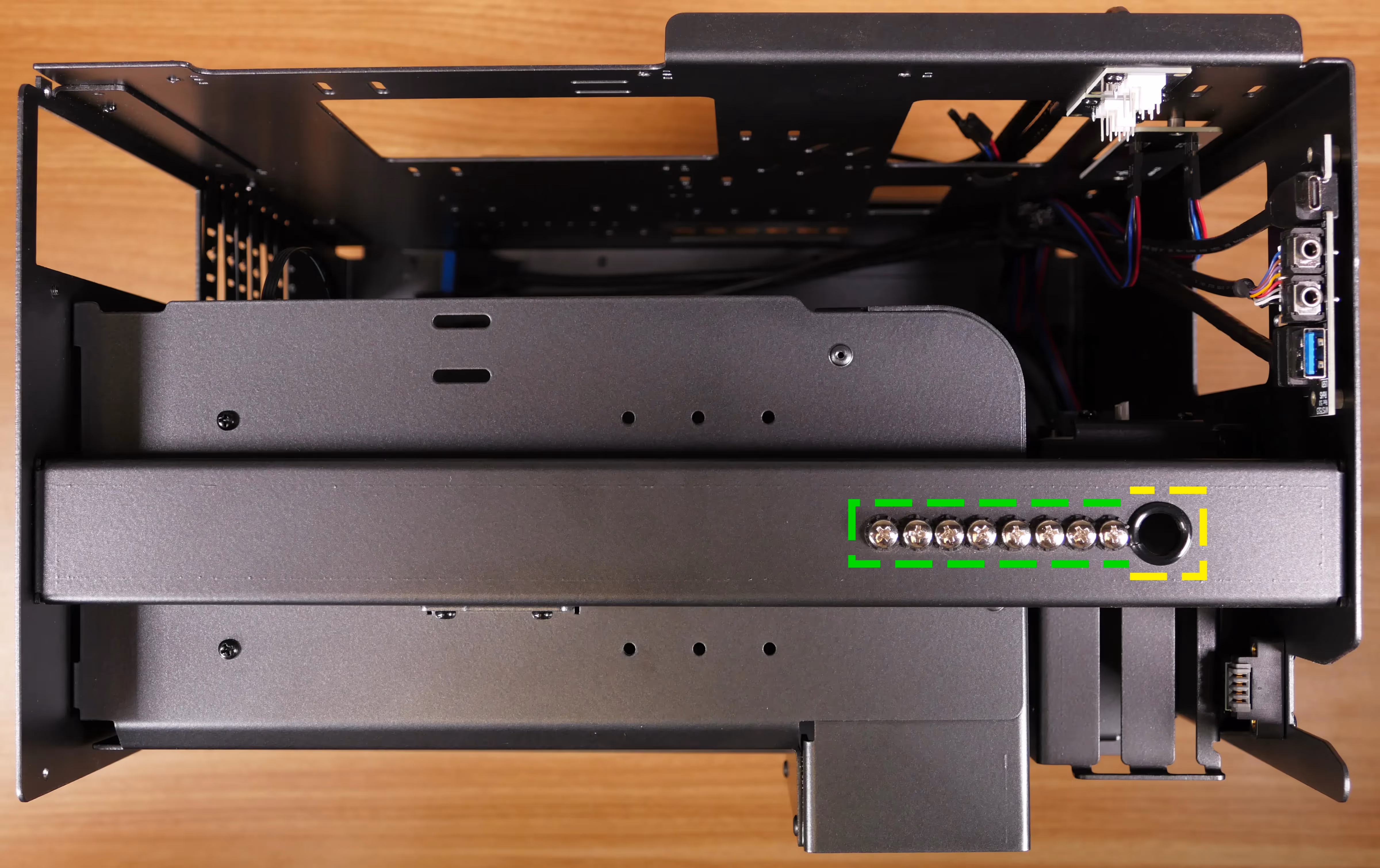 2.5” SATA drive screws on top crossbar