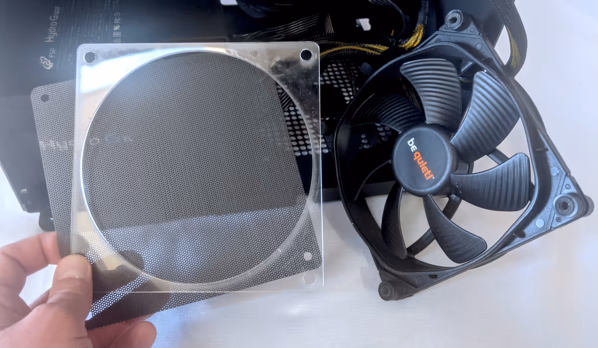 Fan spacer and dust filter