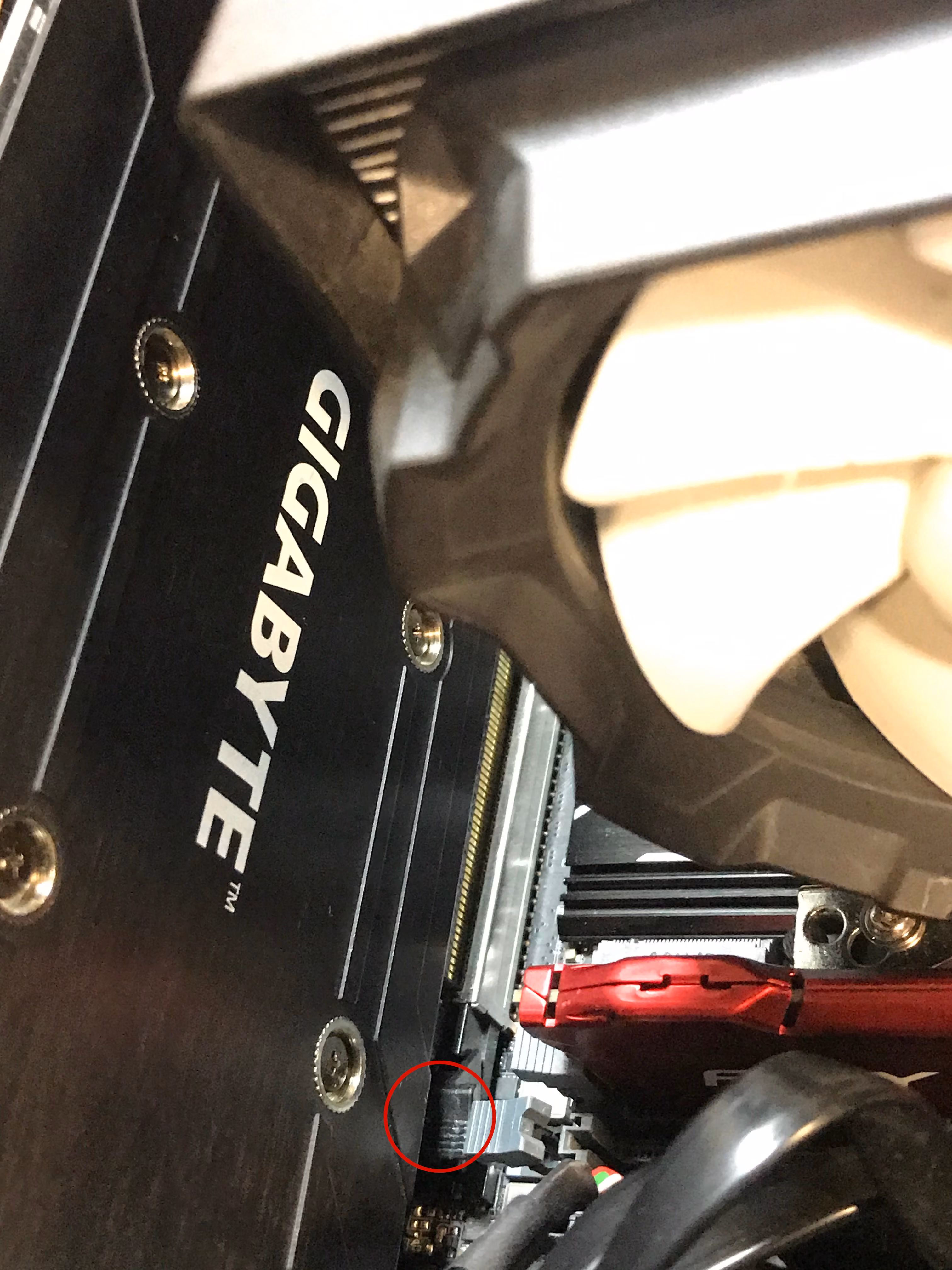 Close view of the GPU leaving the PCIe slot