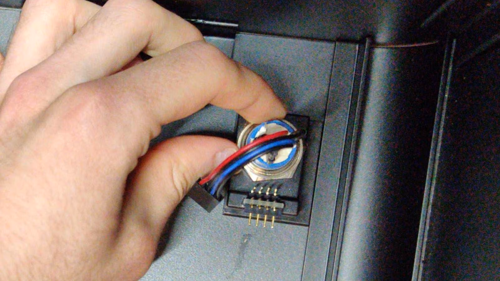 Once loose, the nut can be unscrewed with fingers