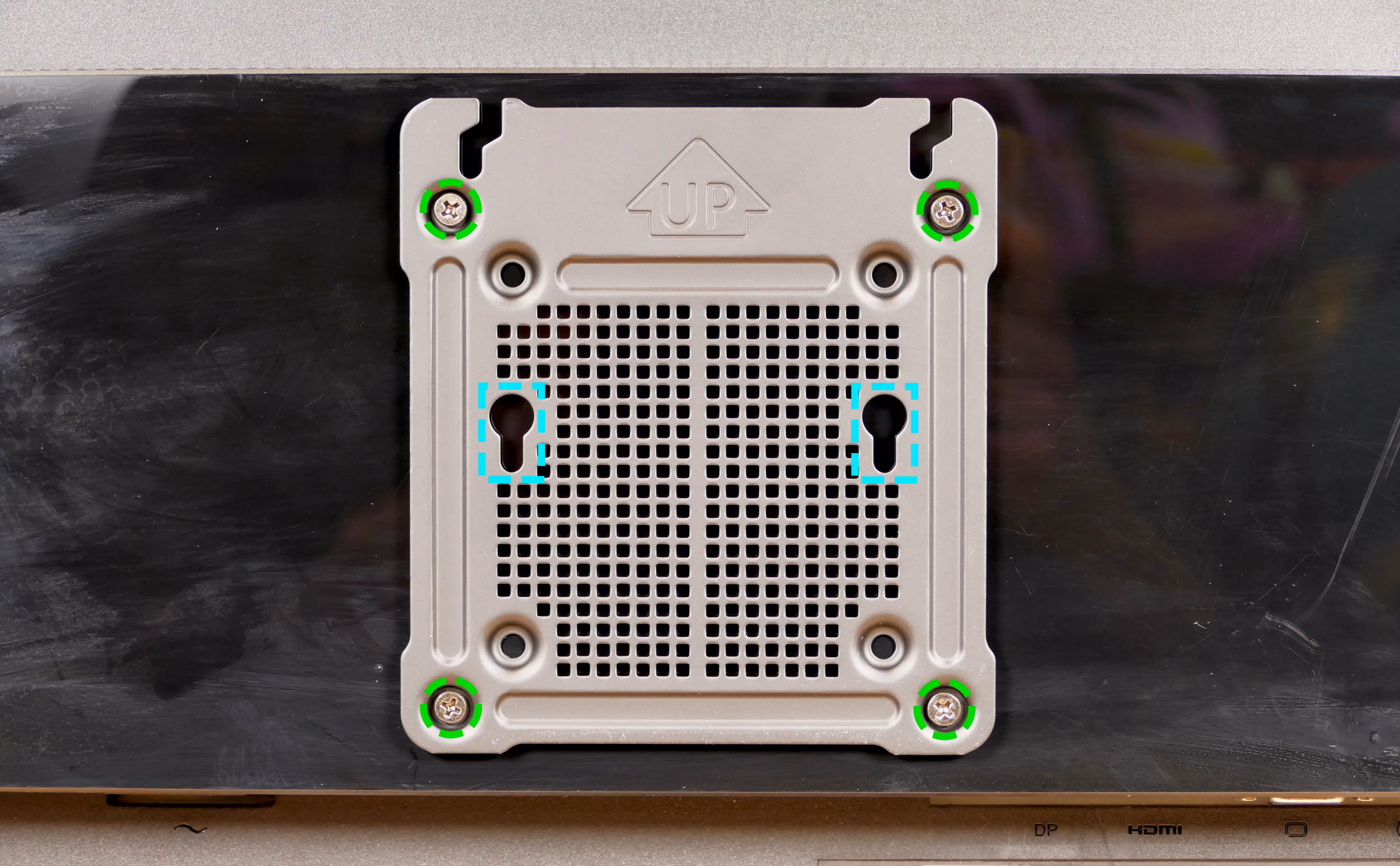VESA mounting plate on display